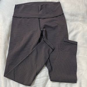 Lululemon black striped leggings. Size 12.